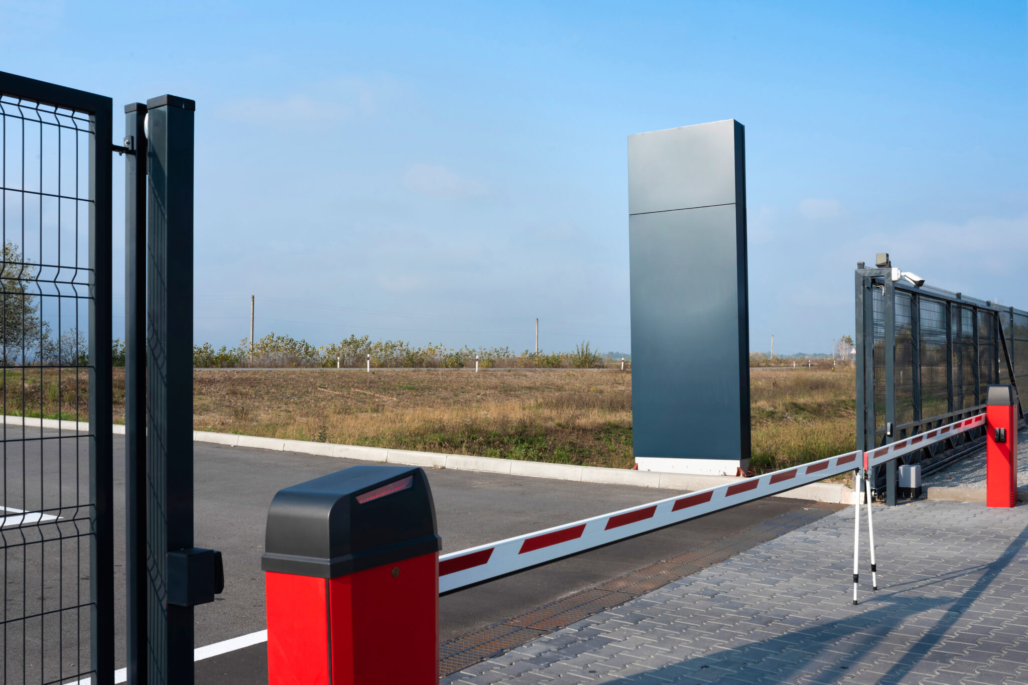 closed automatic gate of the barrier. automatic security system for private areas. automatic entry system, parking barrier