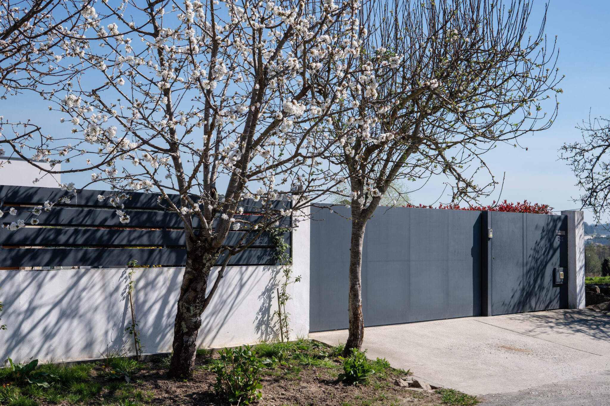modern fence made of concrete and iron
